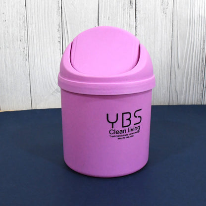Small Wukusy mini trash can with lid, 18x13 cm, compact waste bin for home use, featuring a simple, functional design.