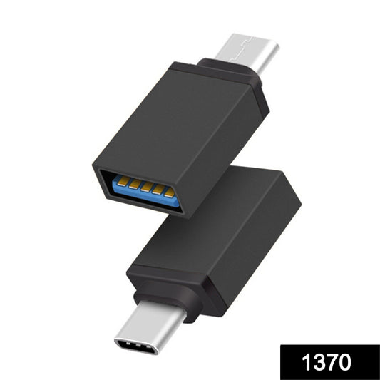 Wukusy 1370 Type-C OTG adapter connected to a smartphone, enabling USB device connections through a compact accessories design.
