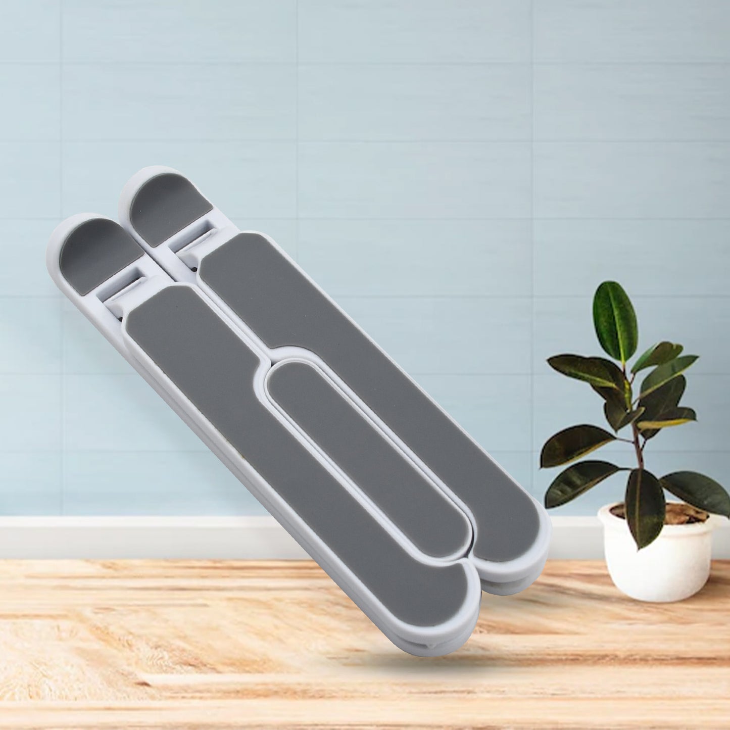 Wukusy adjustable laptop stand holder with foldable legs and high-quality fiber for stable support and ergonomic use.