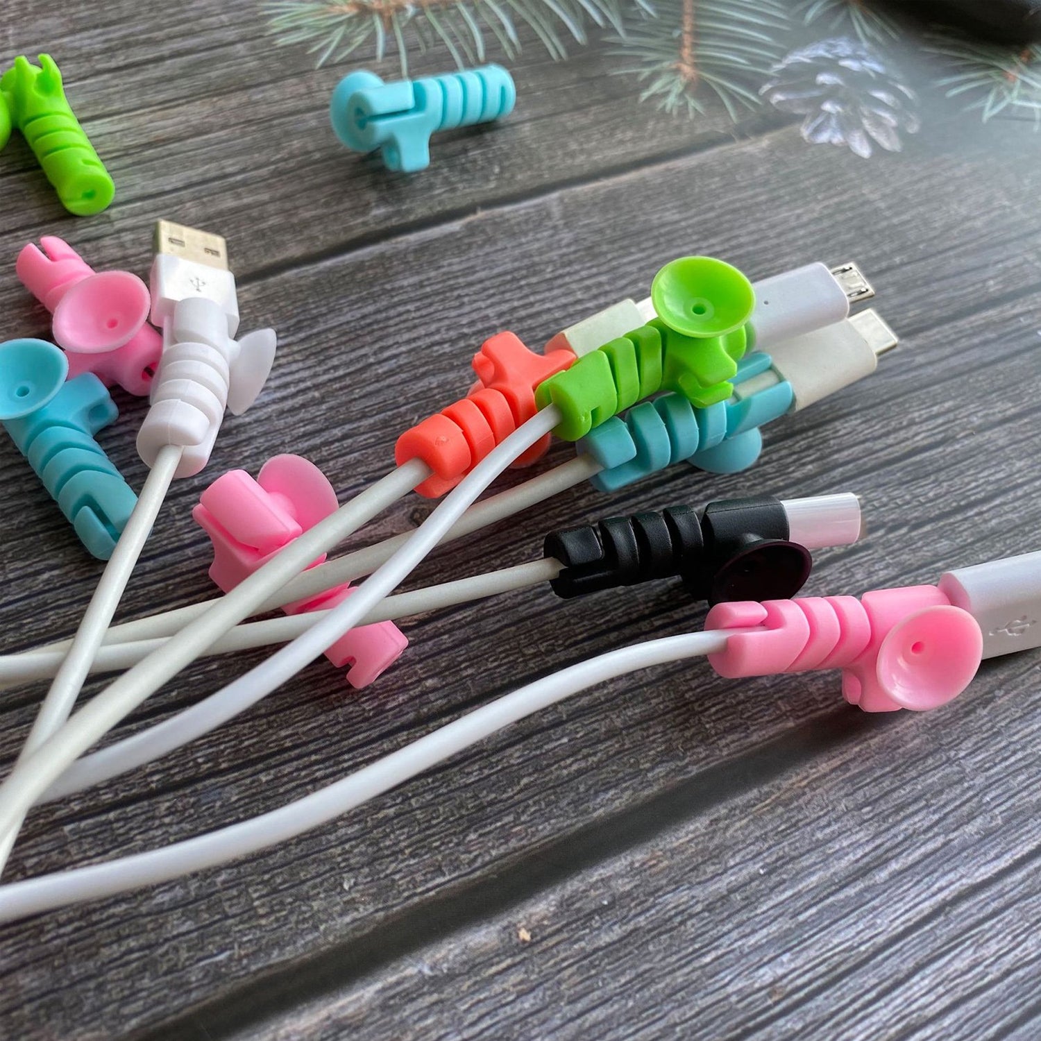 Wukusy cable cord protector saver with suction end, 4-piece set, flexible accessories to prevent cable damage and keep cords organized.