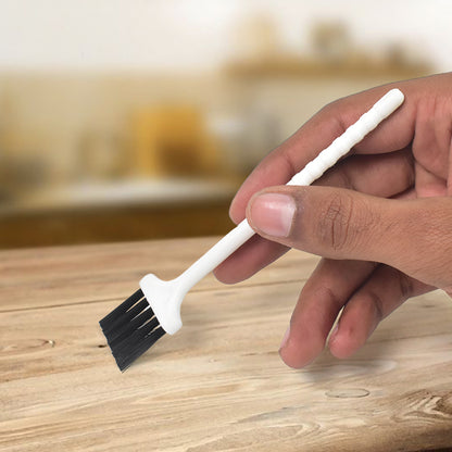 Wukusy laptop cleaning brush and keyboard brush, compact accessory for removing dust and debris from electronics.