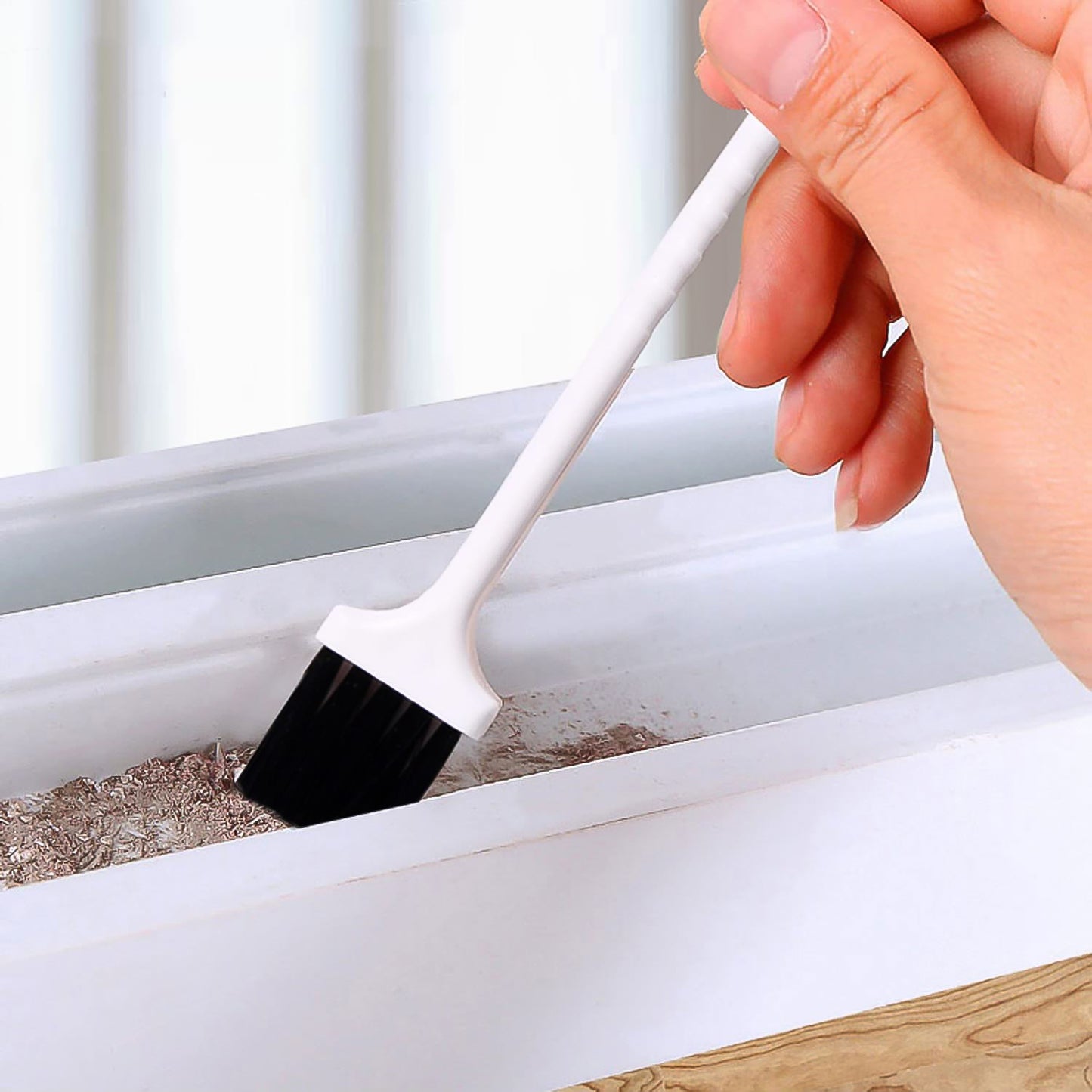 Wukusy laptop cleaning brush and keyboard brush in black, designed for safe and effective cleaning of electronic devices.
