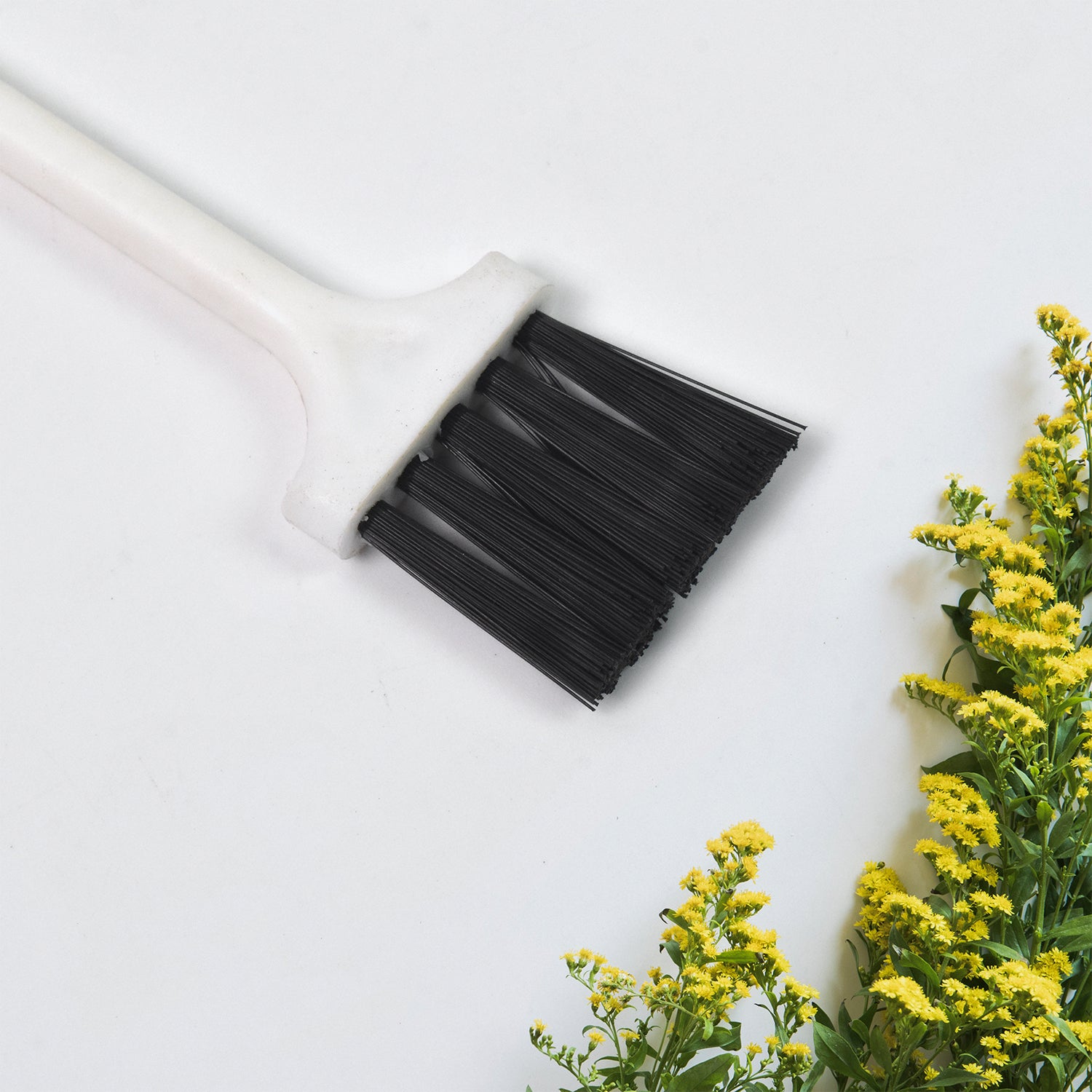 Wukusy laptop cleaning brush and keyboard brush, compact accessory for removing dust and debris from electronic devices.