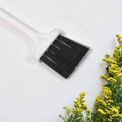 Wukusy laptop cleaning brush and keyboard brush, compact accessory for removing dust and debris from electronic devices.