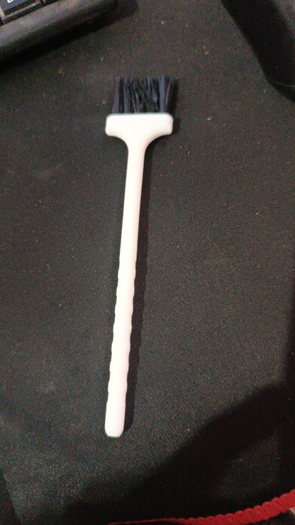 Wukusy laptop cleaning brush and keyboard brush, compact accessories for removing dust and debris from electronic devices.