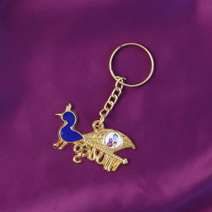 Krishna-themed decorative metal keychain by Wukusy, featuring intricate design and vibrant colors, perfect for accessories.