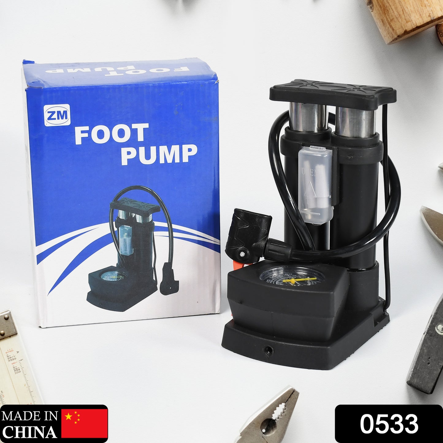 Wukusy portable mini bike pump with foot activation and gauge, designed for bicycle tires, shown in a compact, functional design.