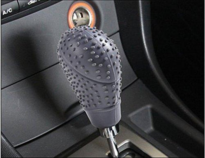 Wukusy automotive anti-scratch bump shift knob protective cover case on a car gear shift, durable and easy to install.