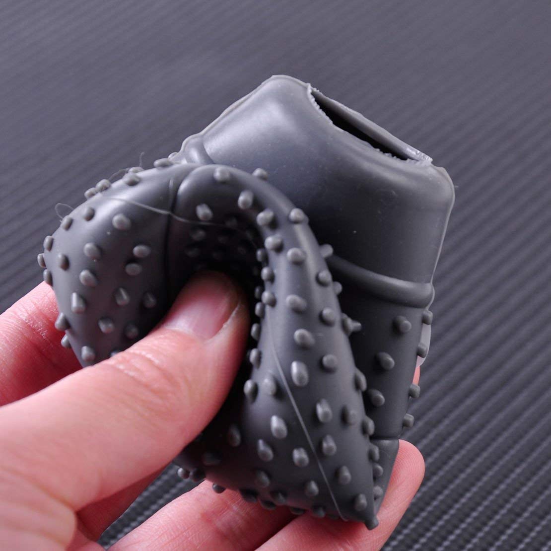 Wukusy 1275 automotive anti-scratch bump shift knob protective cover case installed on a car's gear shift.