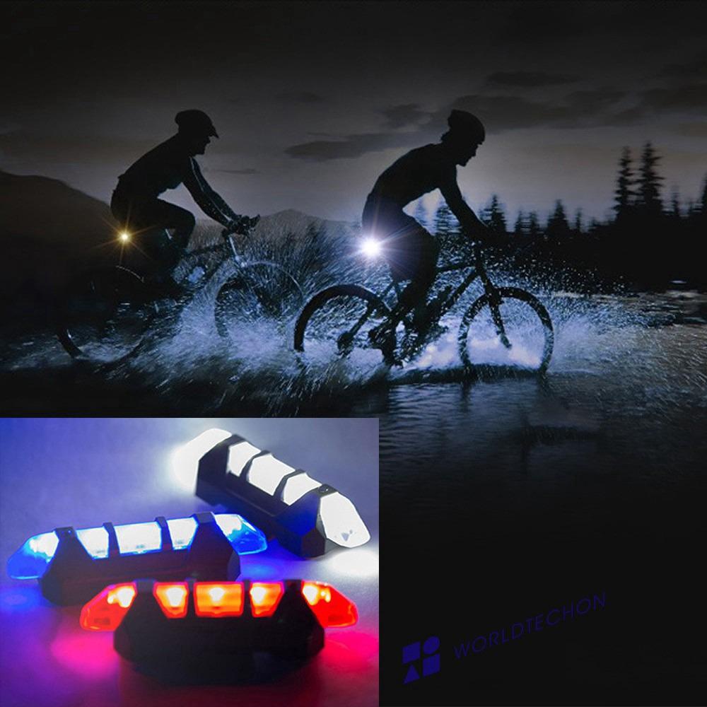 Wukusy 1617 rechargeable bicycle front waterproof LED light in blue, mounted on a bike for visibility and safety.