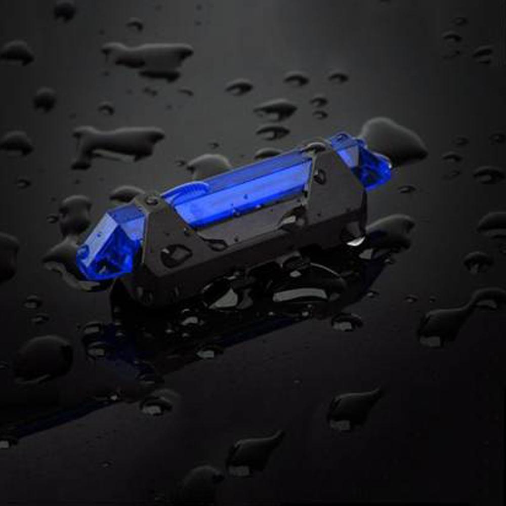 Blue Wukusy 1617 rechargeable waterproof bicycle front LED light mounted on a bike for visibility and safety.