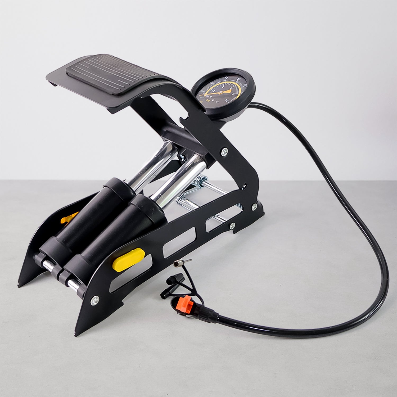 Wukusy portable high-pressure foot air pump compressor for car and bike tires, compact automotive air pump device.