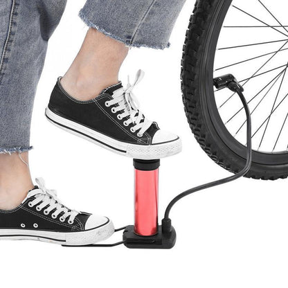 Wukusy 485 portable mini foot pump for bicycles, bikes, and cars, shown in use with compact design and foot pedal for inflation.