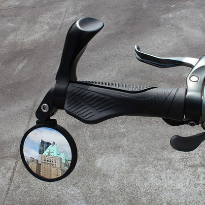 Wukusy 8505 Bar End Bike Mirror, 360 rotatable and foldable durable rearview mirror for bicycles, showing mounted on bike handlebar.