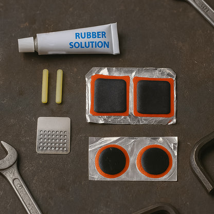 Wukusy bicycle tire repair kit with puncture repair tools and adhesive, portable for quick bicycle tire fixes.