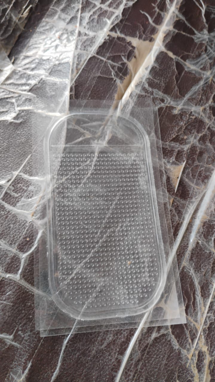 Medium transparent anti-slip car dashboard mat by Wukusy, designed to keep items secure on automotive dashboards.