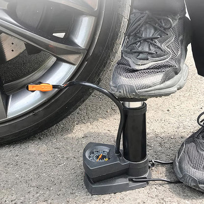 Wukusy portable mini bike pump with foot-operated mechanism, compact automotive cycle pump for inflating bicycle tires.