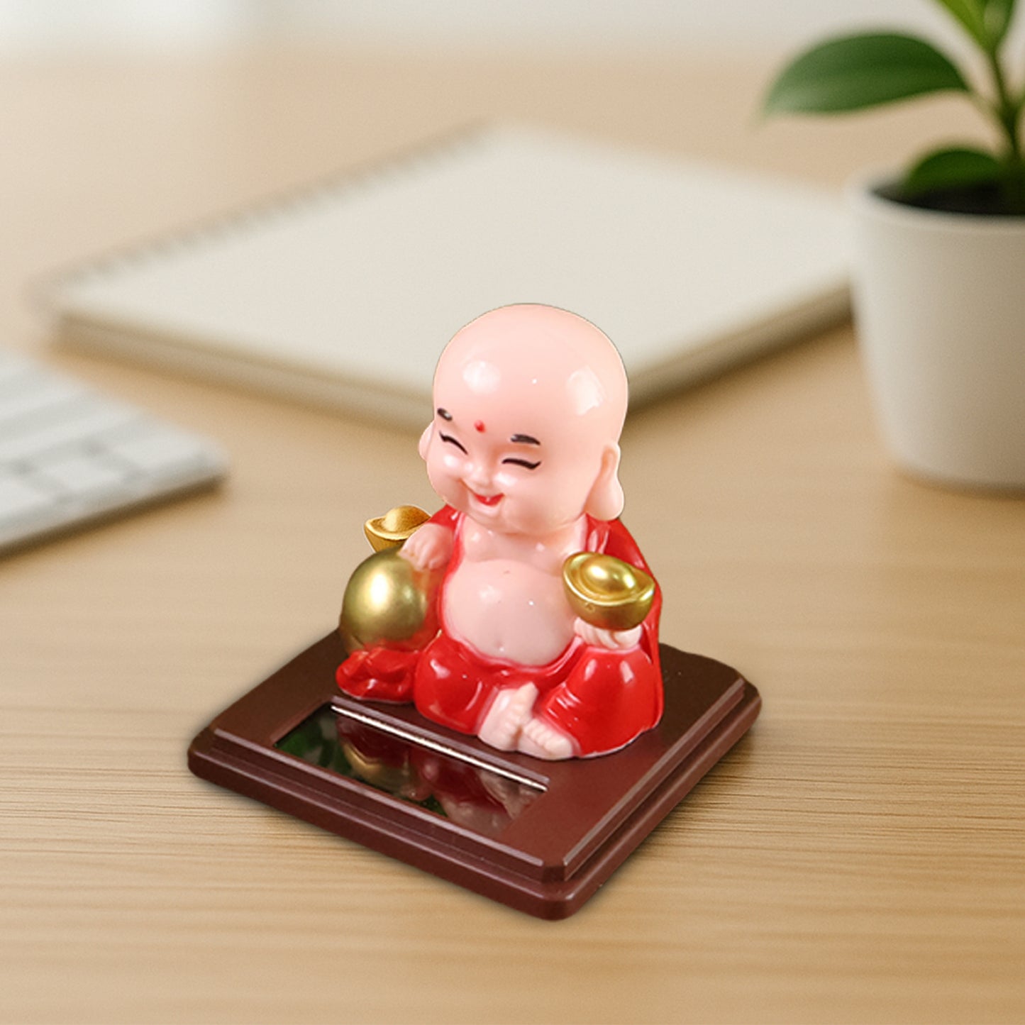 Wukusy solar-powered moving head Buddha car ornament in mixed colors, decorative automotive statue for vehicle interior or exterior.