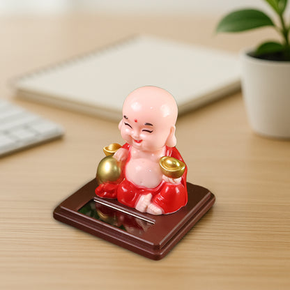 Wukusy solar-powered moving head Buddha car ornament in mixed colors, decorative automotive statue for vehicle interior or exterior.