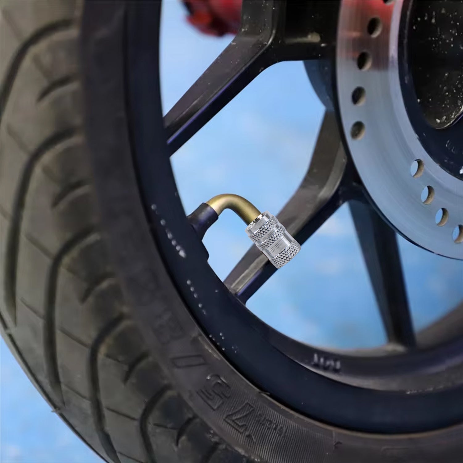 Set of four silver Wukusy tire valve stem caps for Genesis cars, suitable for most cars, trucks, and SUVs as wheel accessories.