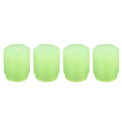 Set of four luminous glow car tyre valve caps by Wukusy, automotive tire valve covers with a glowing design.