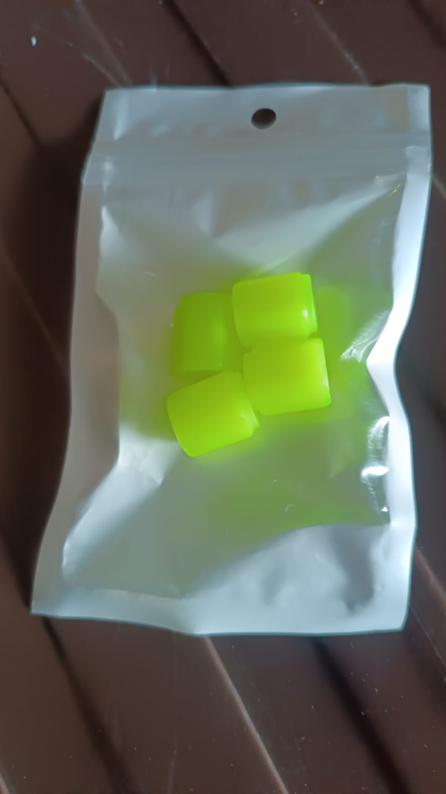 Set of four Wukusy luminous glow car tire valve caps, automotive accessories for stylish and visible tire valve coverage.