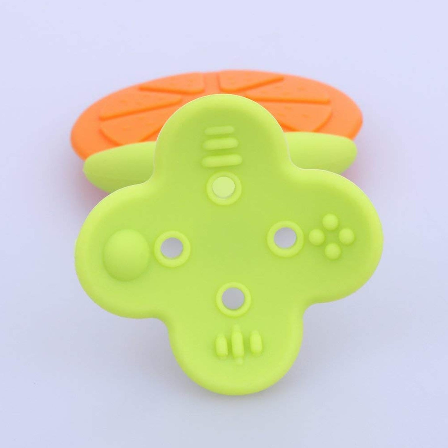 Wukusy silicone fruit-shaped teether toy for babies and toddlers, made from food-grade silicone, safe for infants and children.