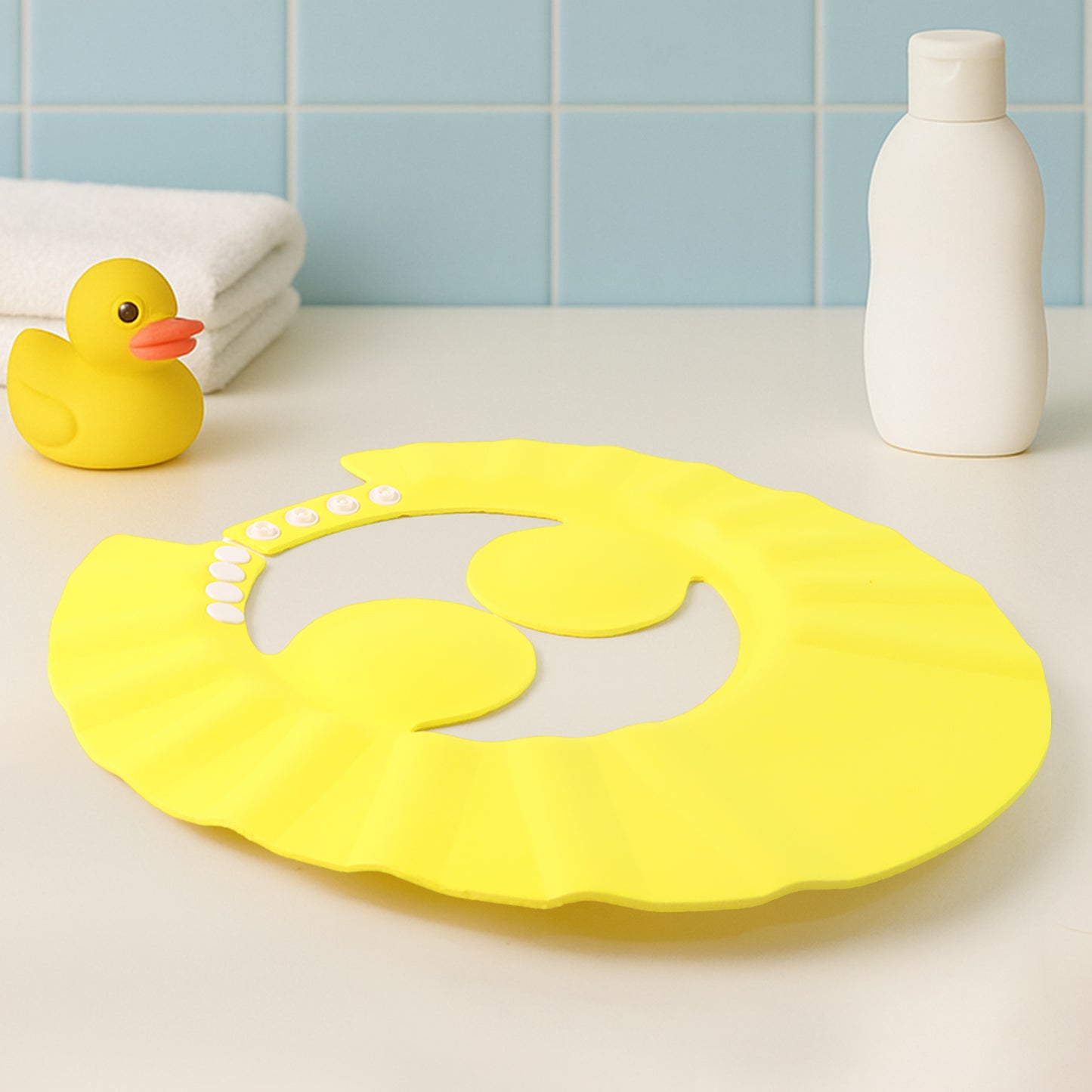 Adjustable Wukusy baby shower cap for gentle hair washing, made of soft, waterproof material, suitable for infants and toddlers.