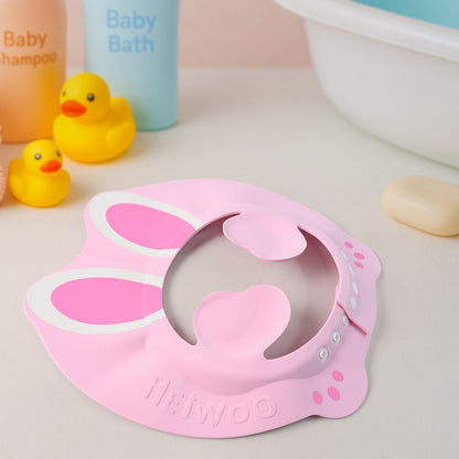 Adjustable bunny ear baby shower cap by Wukusy, soft baby care accessory with cute bunny ear design for infants.