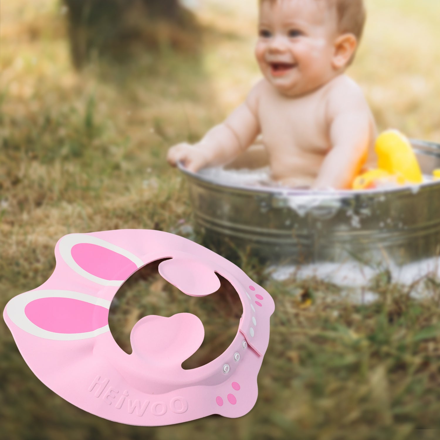 Wukusy adjustable bunny ear baby shower cap made of soft fabric, designed to keep babies comfortable and adorable during baths.