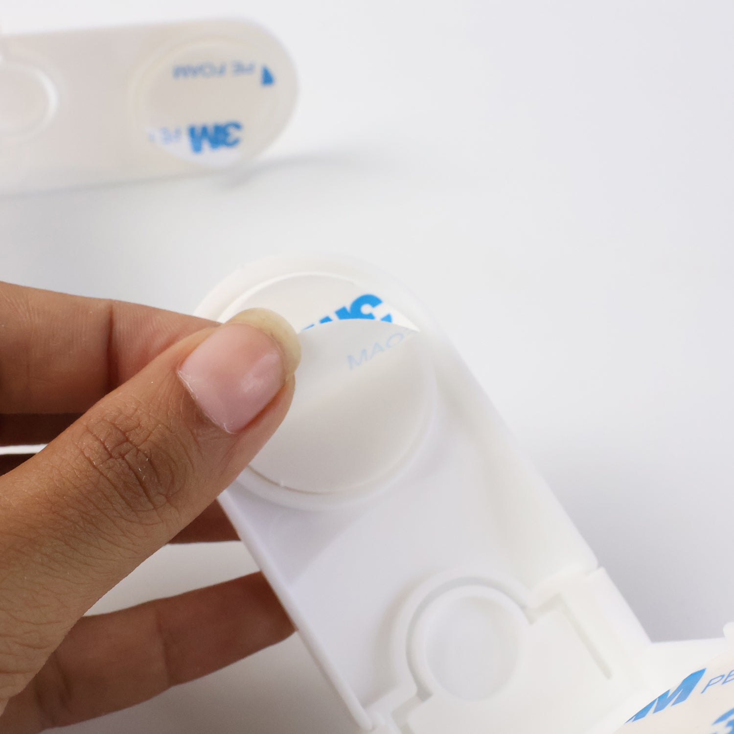 Wukusy Baby Safety Cabinet Lock 2-Pack for child-proofing cabinets and drawers, made of durable plastic for baby safety.