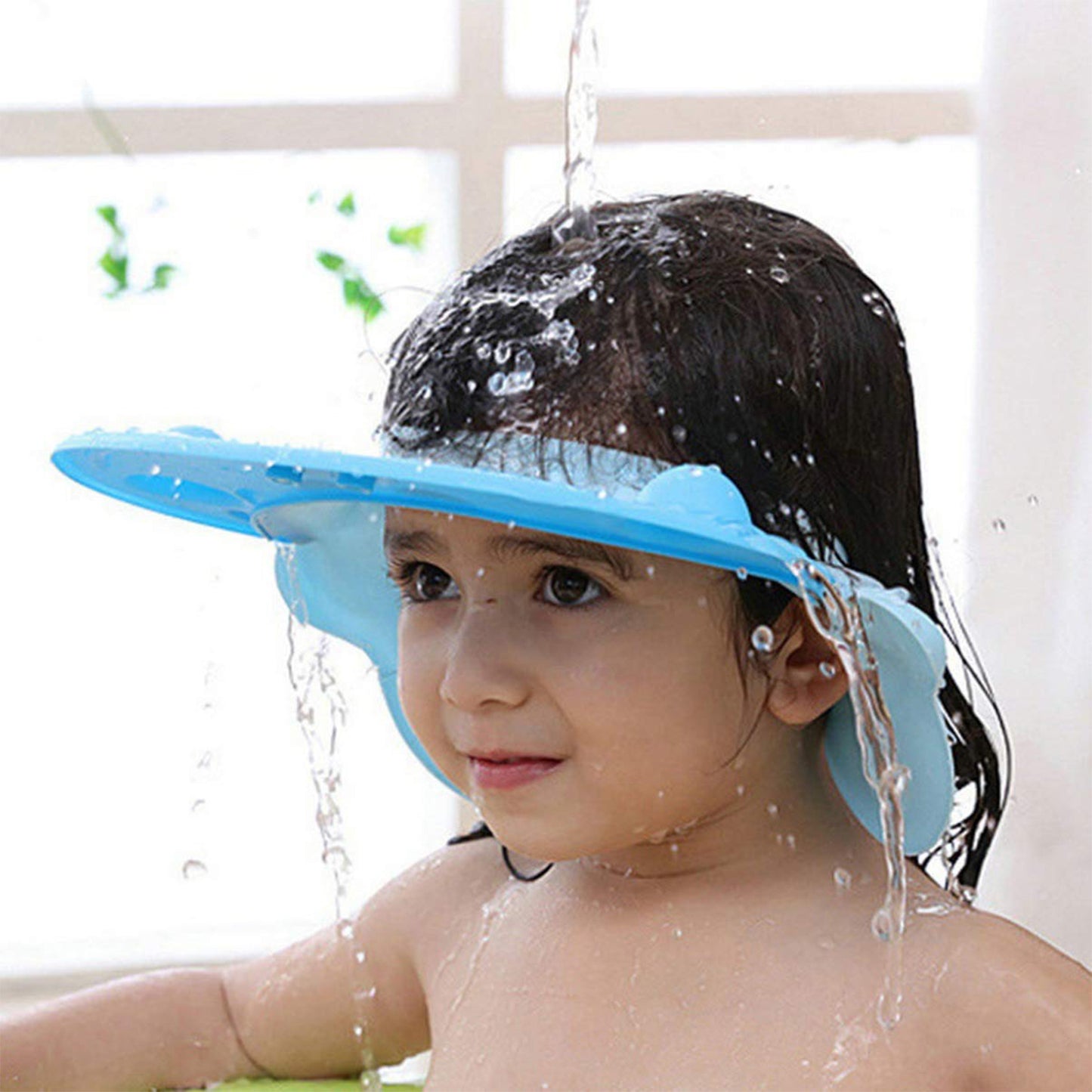 Baby silicone shower cap by Wukusy, small size, designed for gentle hair protection during bath time.