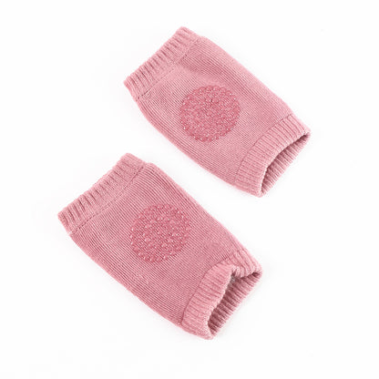 Pink toddler wool knit leg warmer and knee guard by Wukusy, soft and cozy for baby care, designed for warmth and protection.