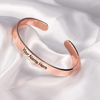 Personalized stylish rose gold copper Kada bracelet by Wukusy, featuring intricate design on a sleek, fashionable bracelet.