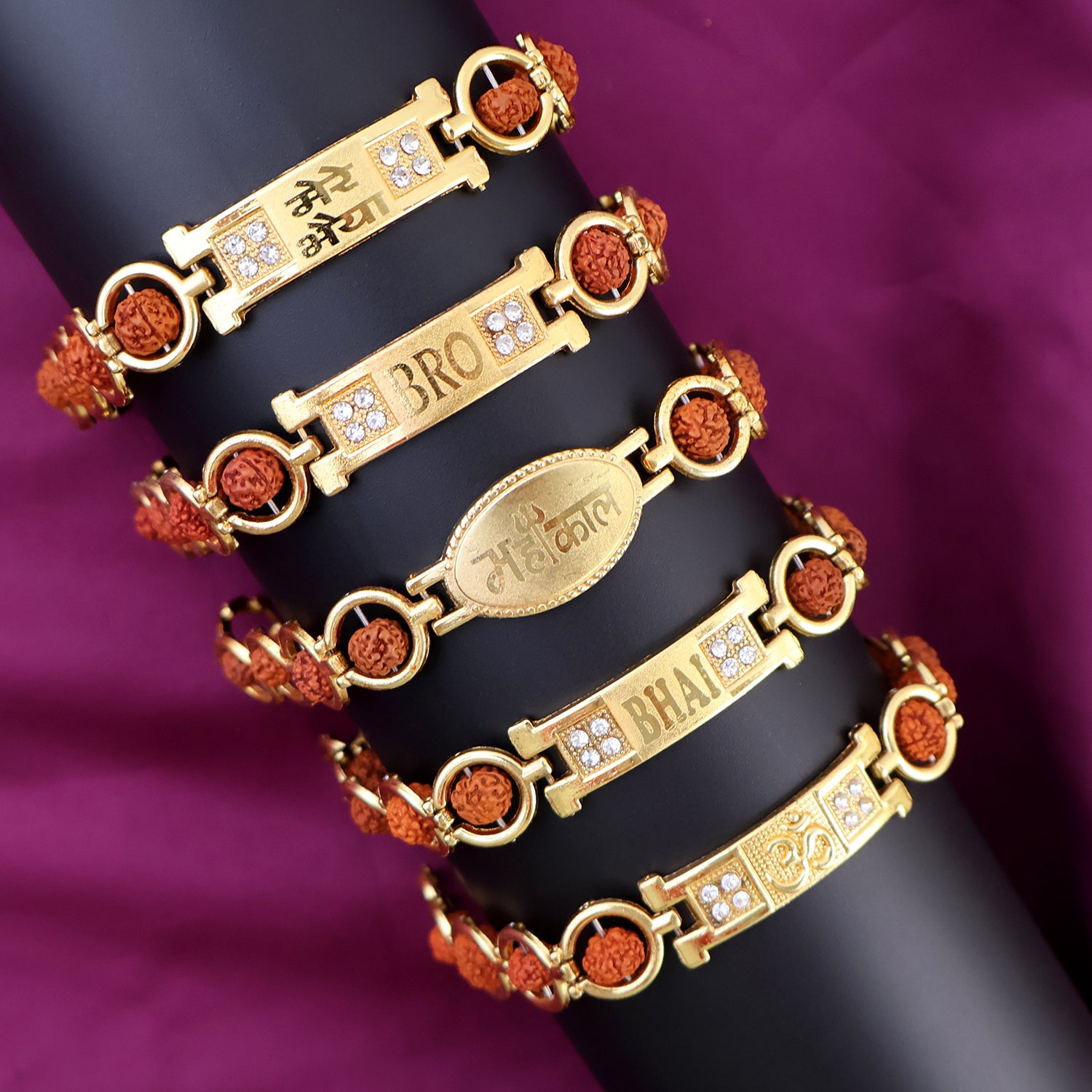 Gold plated designer circular bead bracelet for brother, Wukusy Rakhi, featuring mix design, on a neutral background.