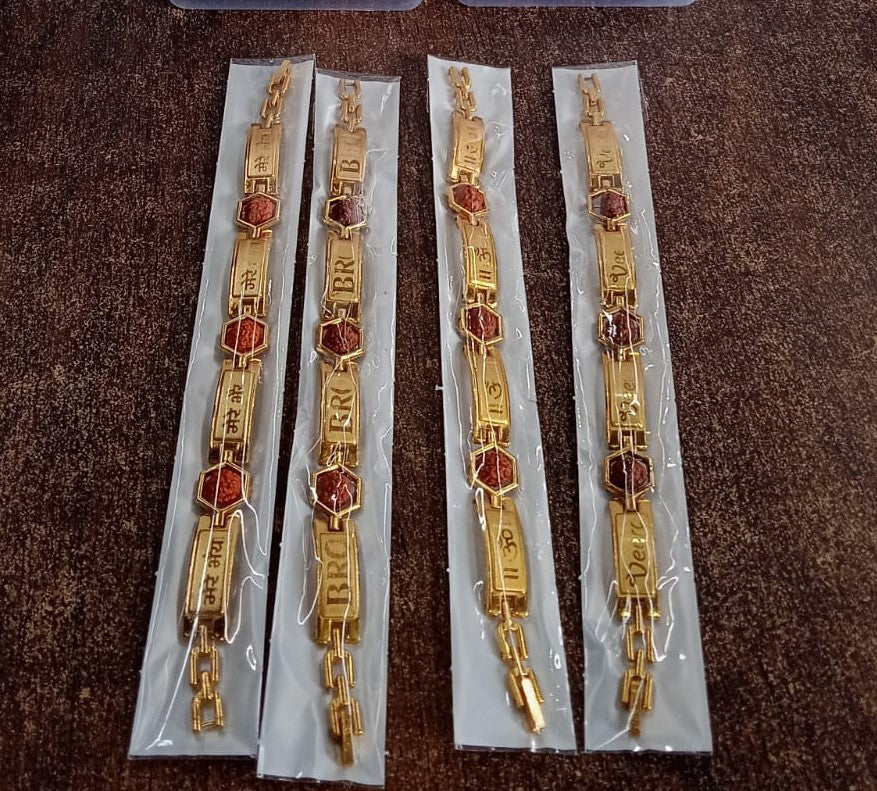Gold plated hexa bead bracelet rakhi for brother by Wukusy, featuring a stylish design with gold-colored beads and intricate detailing.