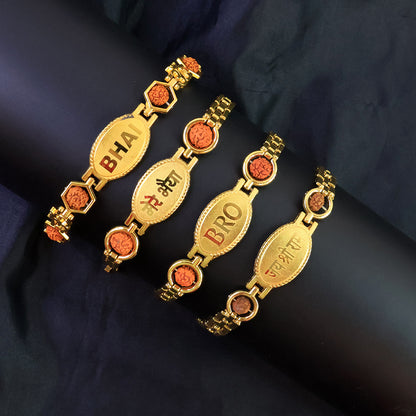 Gold plated metal bracelet rakhi for brother by Wukusy, featuring intricate design and traditional style.