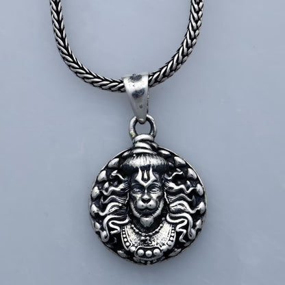 Wukusy Hanuman face pendant bracelet with chain, featuring detailed carved Hanuman face on a durable metal chain.