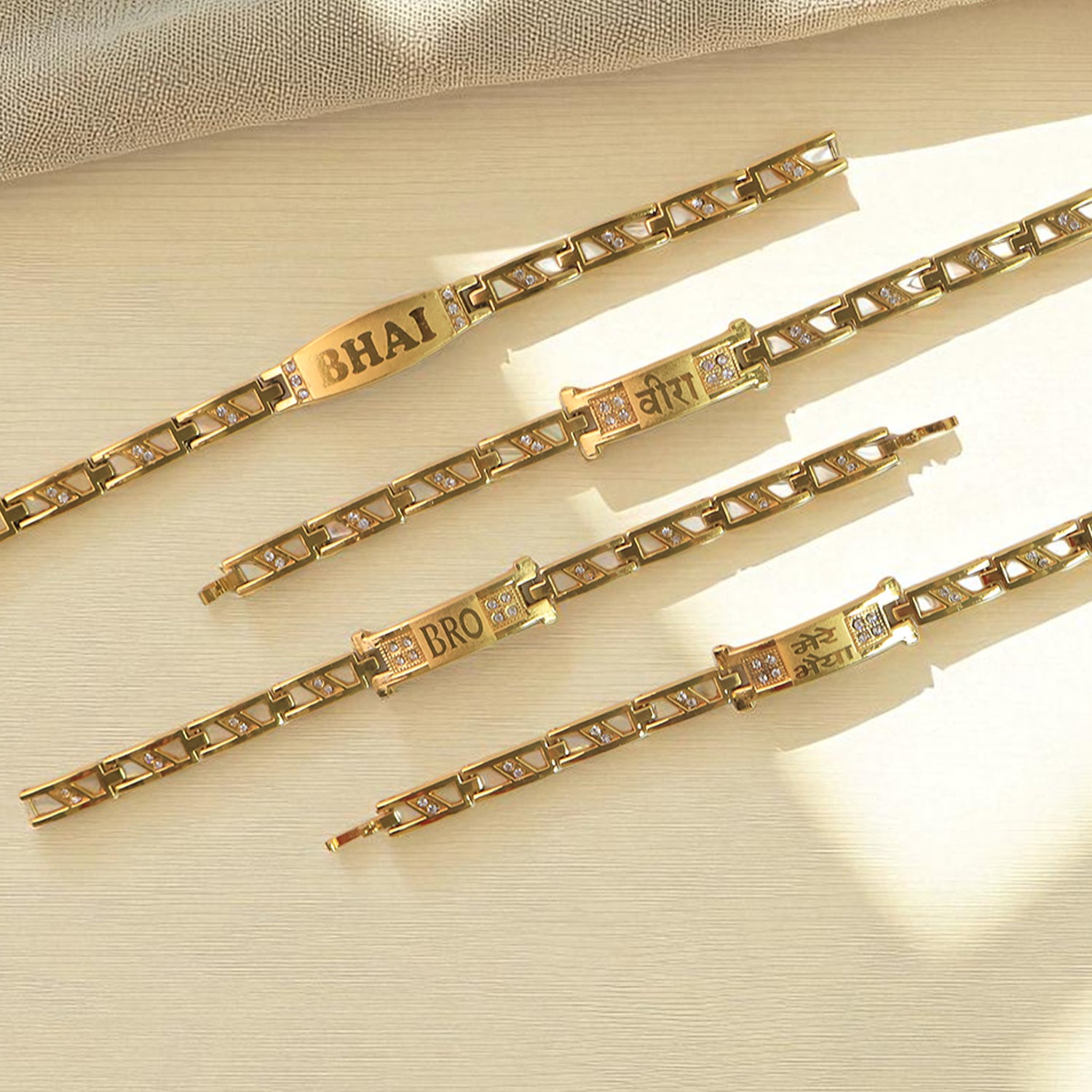 Wukusy metal Rakhi bracelet for brother with chain design and wording, featuring a mix of decorative elements on a sleek bracelet.