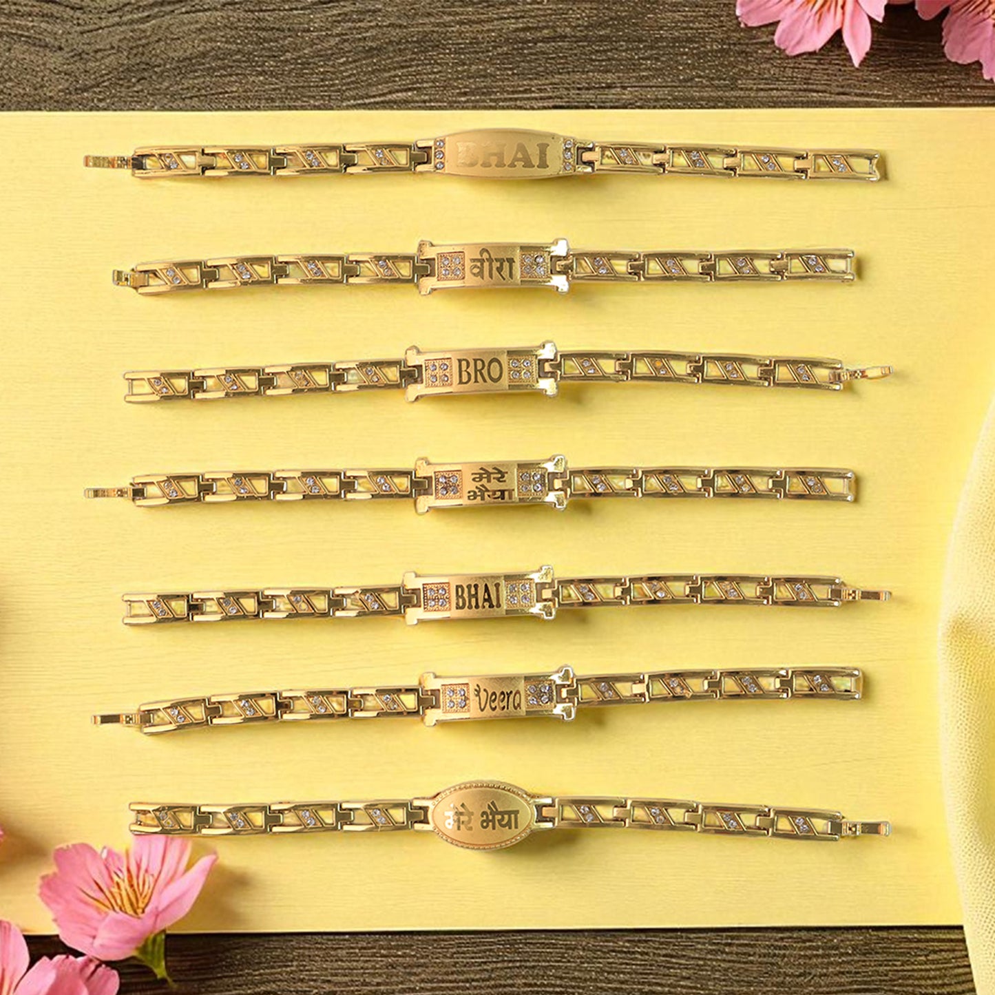 Wukusy metal Rakhi bracelet for brother with chain design and wording, mix of styles, close-up view of the bracelet.