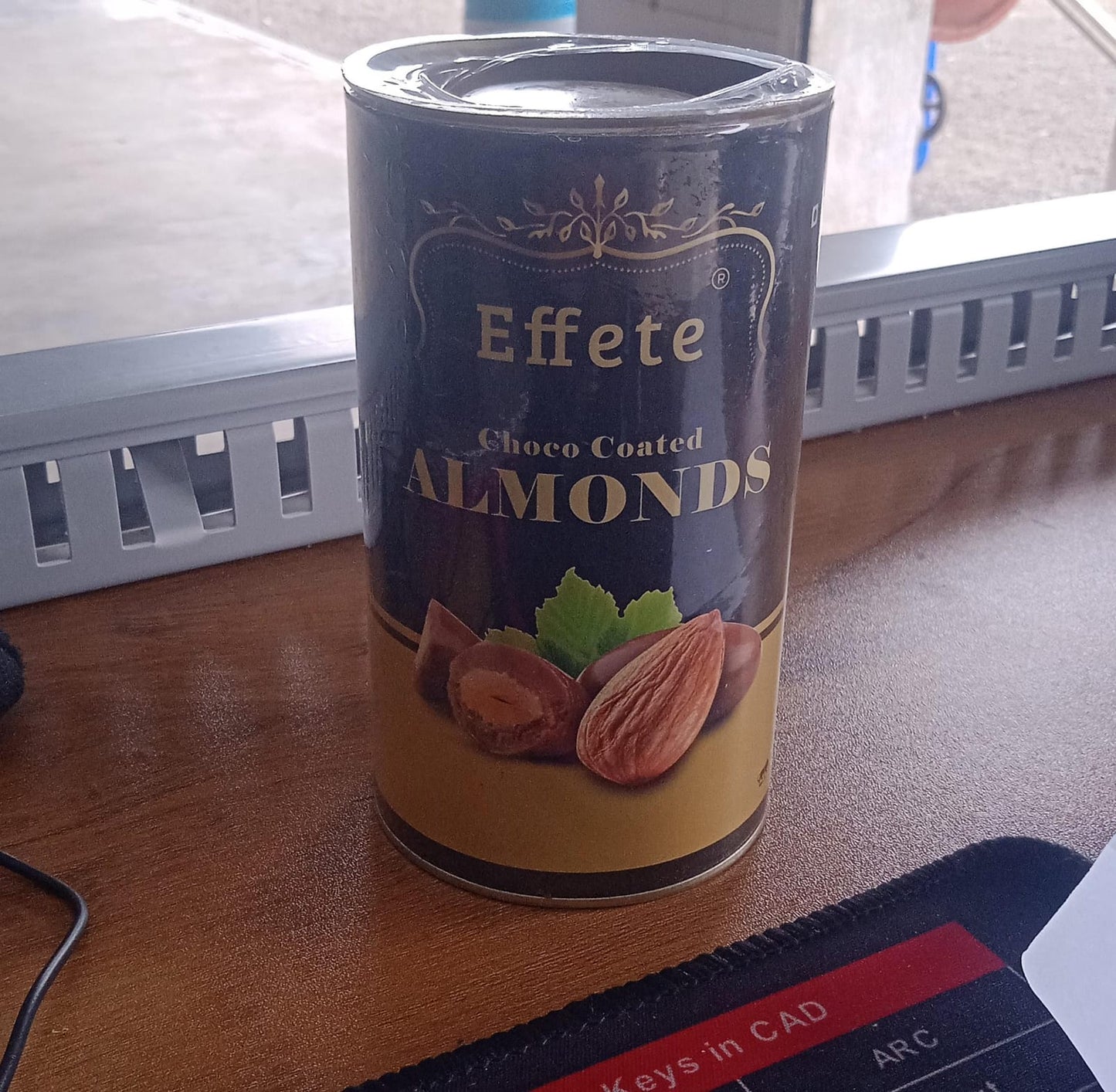 Wukusy Choco Almond chocolates featuring crunchy almonds coated in smooth milk chocolate.