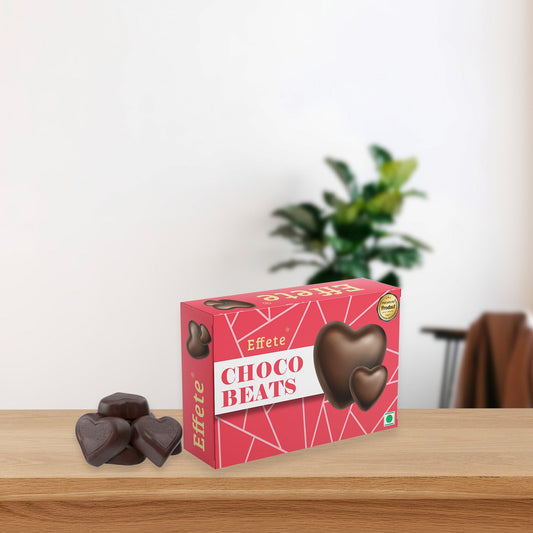 Wukusy Choco Beats heart-shaped chocolates with rich, smooth milk chocolate and decorative toppings, perfect for gifting or treats.