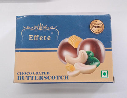 Wukusy chocolate-coated butterscotch candies with a glossy, smooth chocolate coating and golden butterscotch center.