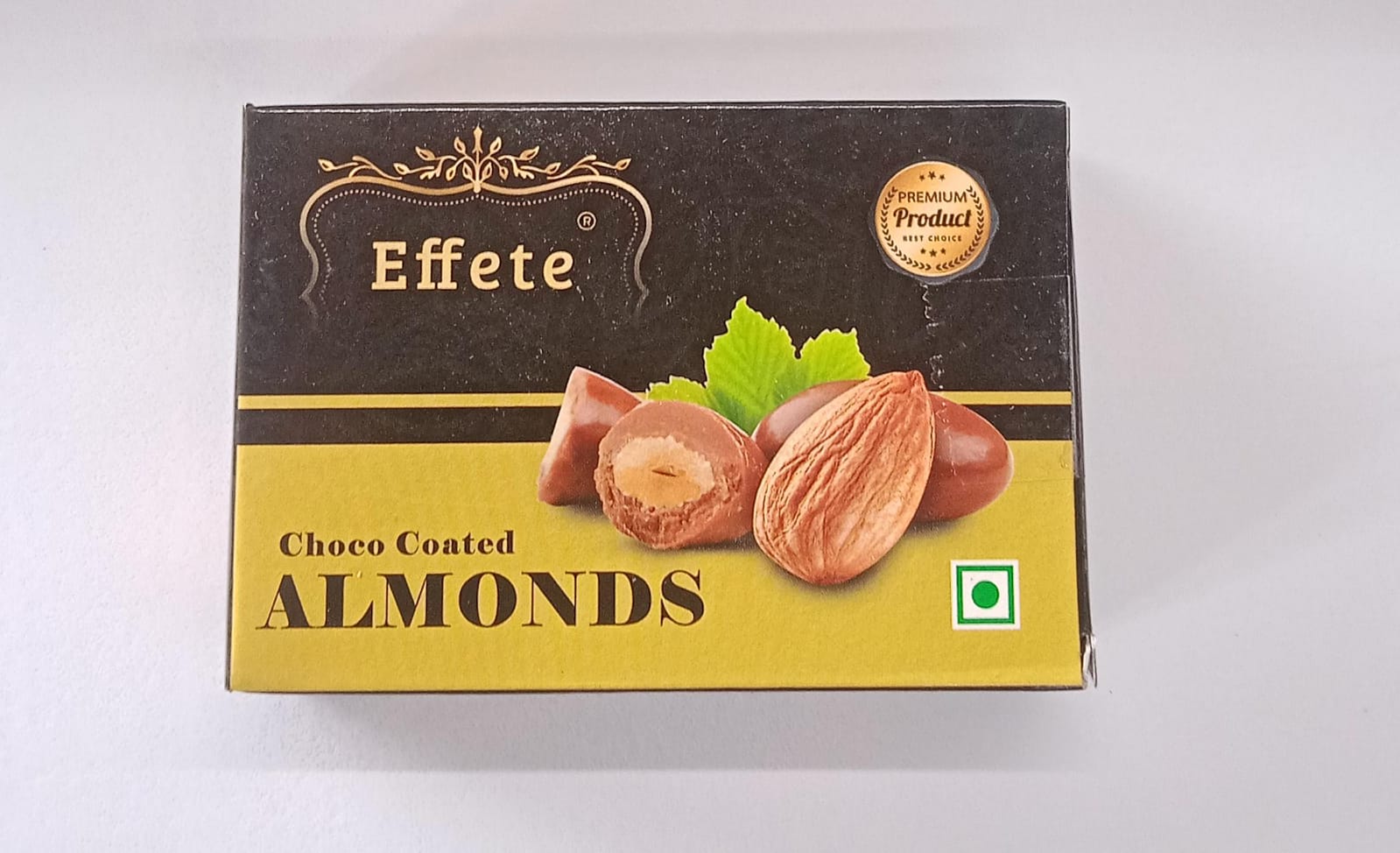 Wukusy Delicious Almond Chocolate chocolates featuring rich chocolate and crunchy almond pieces, displayed in a gift box.