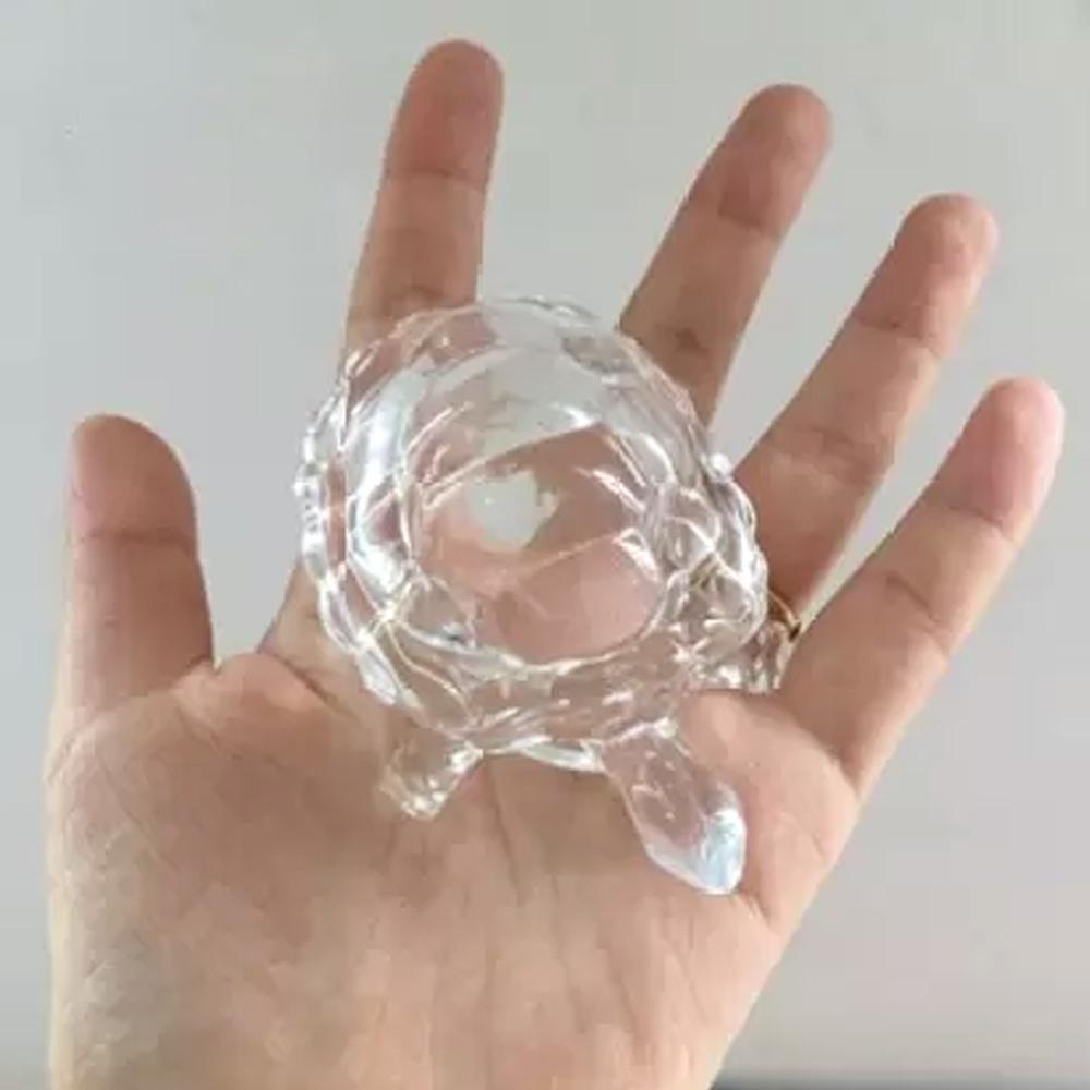 Crystal glass turtle figurine by Wukusy, ideal for Feng Shui and Vastu, featuring a detailed turtle design on a clear glass surface.