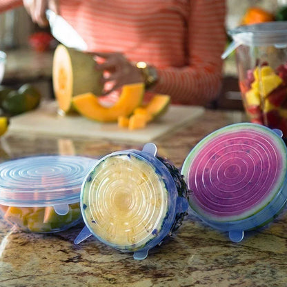 Wukusy 12-piece reusable stretch food cover lids set with two storage pouches, flexible silicone lids for food preservation.