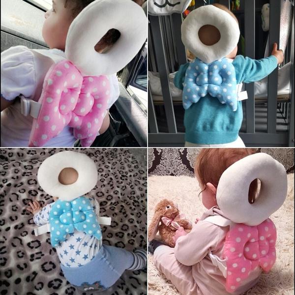 Wukusy baby head protector safety pad for toddlers, soft cushioned head guard to prevent injuries during play or learning.