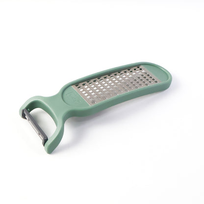 Wukusy 2-in-1 vegetable peeler and grater tool for peeling and grating vegetables and fruits efficiently.