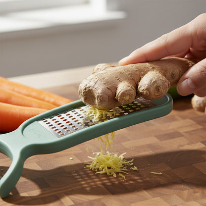 Wukusy 2-in-1 vegetable peeler and grater tool with ergonomic handle and stainless steel blades for peeling and grating vegetables
