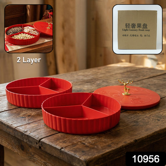 Wukusy 2-layer decorative dry fruit and snack serving tray with multiple compartments, used for serving dry fruits and snacks.